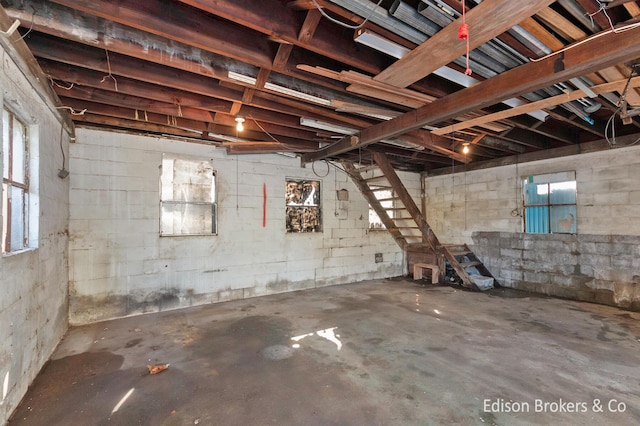 basement featuring concrete block wall