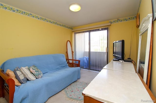 living room featuring light colored carpet