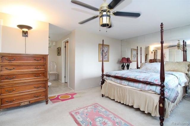 bedroom with light carpet and ceiling fan