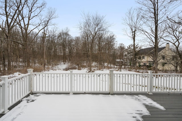 view of snow covered deck