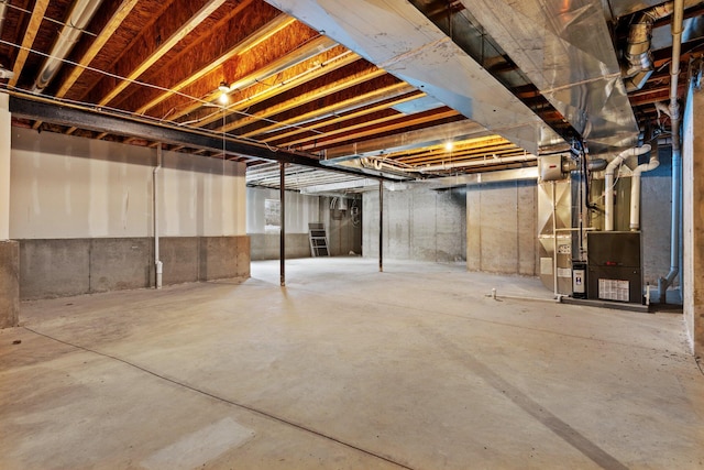 unfinished basement with heating unit