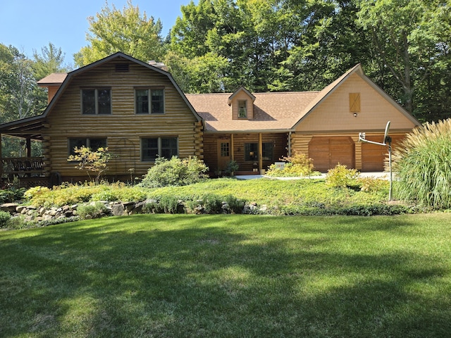 cabin with a garage, a front lawn, a gambrel roof, and log siding