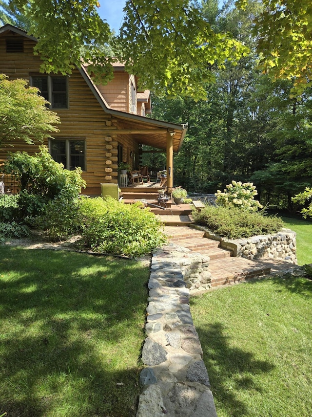 view of yard featuring a deck