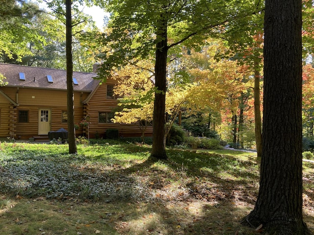 view of yard with entry steps