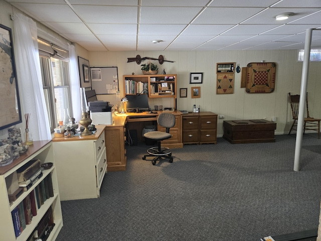 office space featuring a drop ceiling and dark carpet