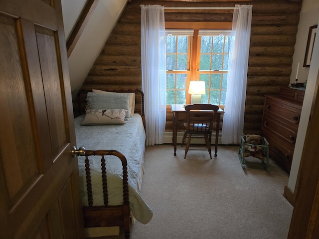 carpeted bedroom featuring baseboard heating