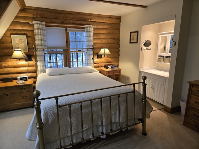 bedroom with carpet flooring and baseboards