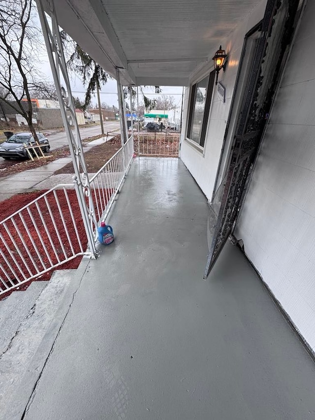 view of patio featuring a porch