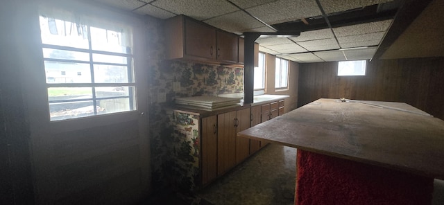 kitchen featuring a paneled ceiling