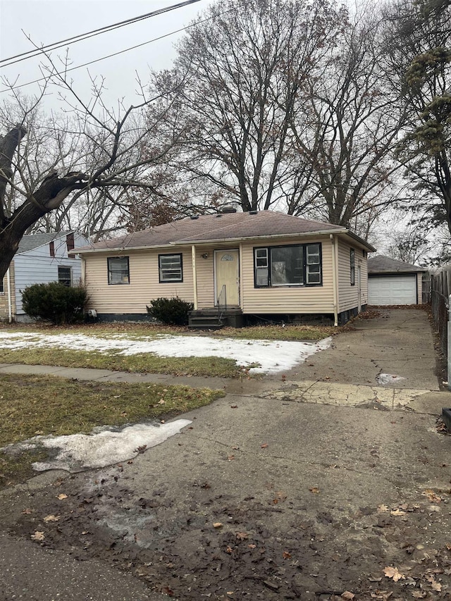 view of front of property with an outbuilding and a garage