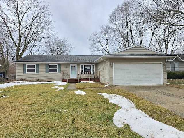 single story home with a garage, driveway, and a front lawn