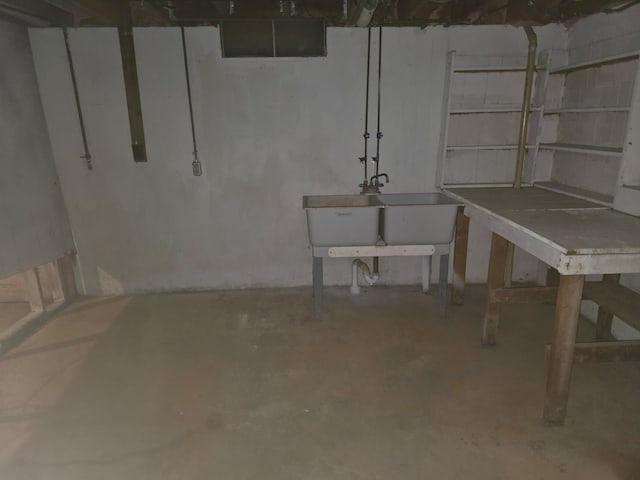 unfinished below grade area with a sink