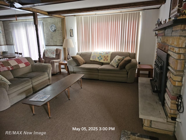 5243 Martin Rd, Beaverton, MI 48612 - carpeted living area featuring a stone fireplace