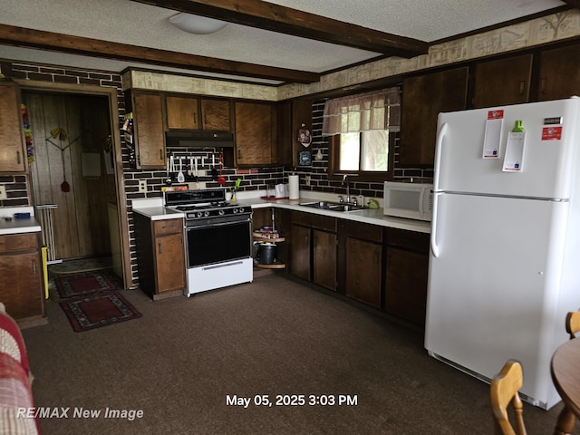 5243 Martin Rd, Beaverton, MI 48612 - kitchen with white appliances, light countertops, tasteful backsplash, dark brown cabinets, and beam ceiling