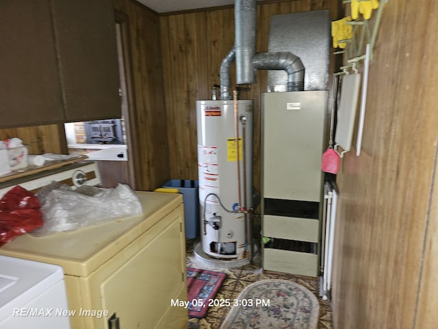 5243 Martin Rd, Beaverton, MI 48612 - utility room featuring water heater and washer / clothes dryer