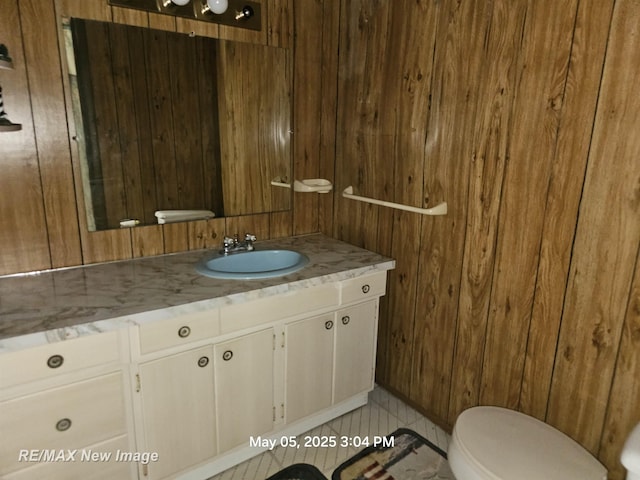 5243 Martin Rd, Beaverton, MI 48612 - bathroom with wooden walls and vanity