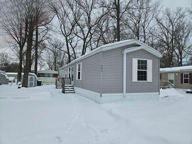 view of snow covered property