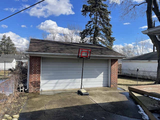 garage with fence