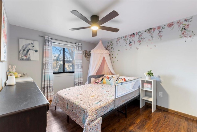 bedroom with dark wood finished floors, baseboards, and ceiling fan