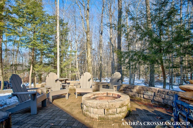 view of patio featuring an outdoor fire pit