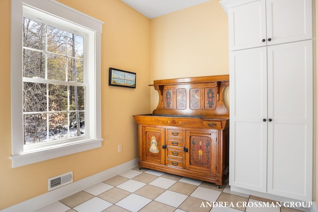 interior space featuring visible vents and baseboards