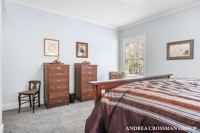 bedroom with light carpet, crown molding, and baseboards