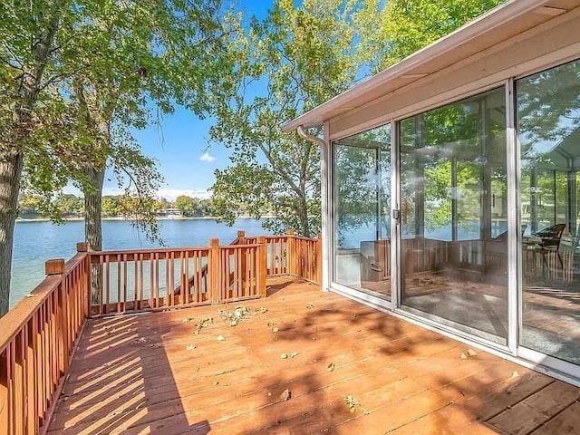 deck featuring a water view