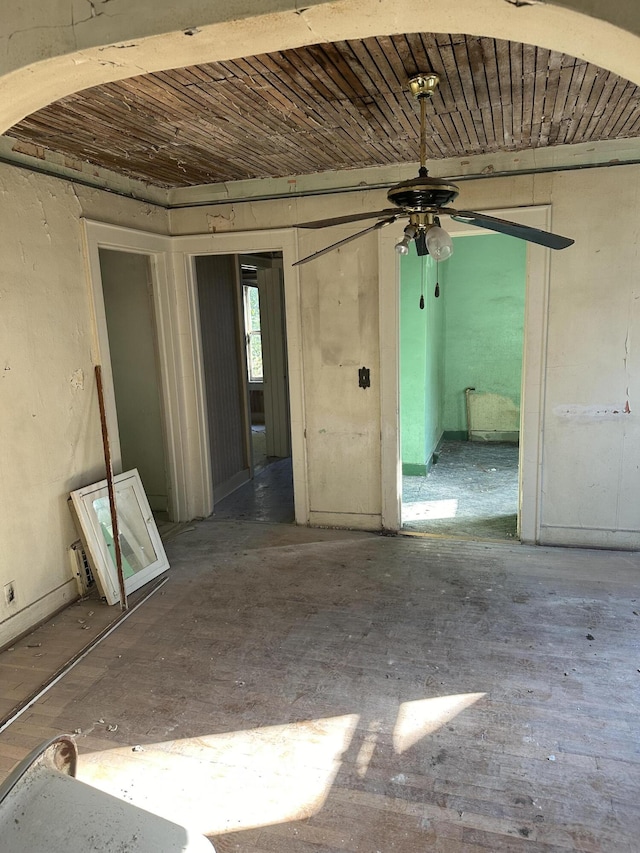 unfurnished room with wood ceiling