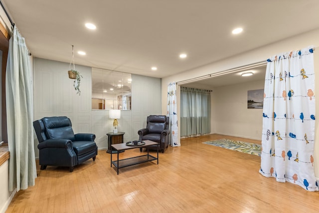 sitting room featuring recessed lighting and wood-type flooring