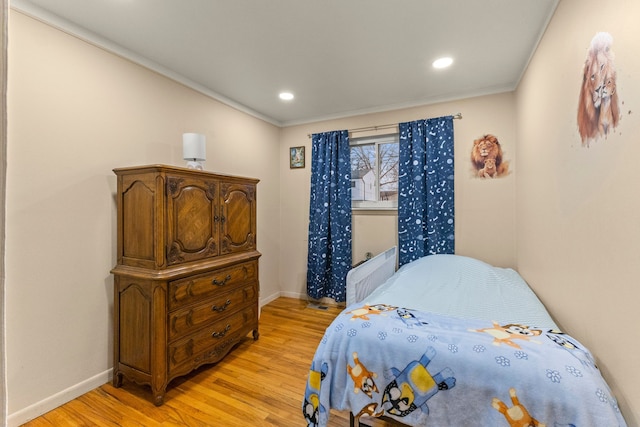 bedroom featuring recessed lighting, baseboards, and light wood finished floors