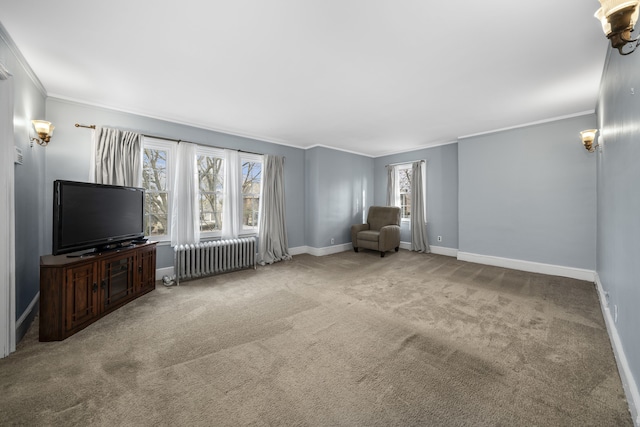 unfurnished room featuring ornamental molding, carpet, radiator, and baseboards