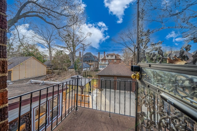 balcony featuring a residential view