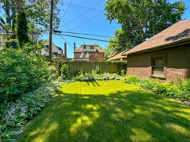 view of yard with fence