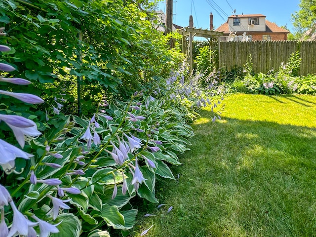 view of yard featuring fence