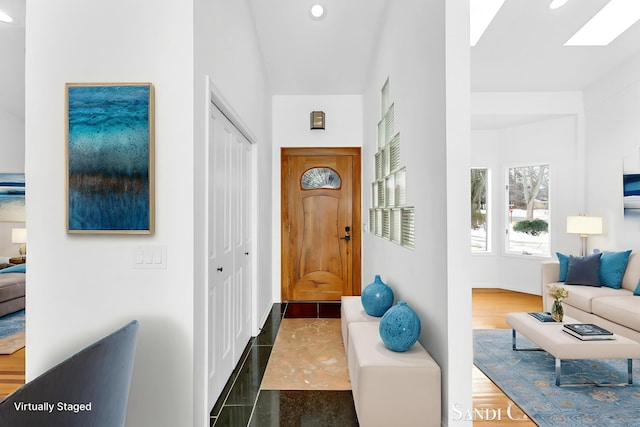 760 Bridgeview Bay Dr, Norton Shores, MI 49441 - entrance foyer with recessed lighting and a skylight