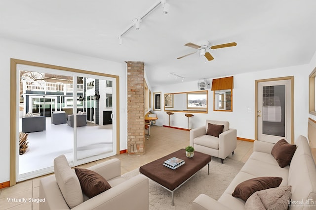 760 Bridgeview Bay Dr, Norton Shores, MI 49441 - living room featuring track lighting, light tile patterned floors, and ceiling fan