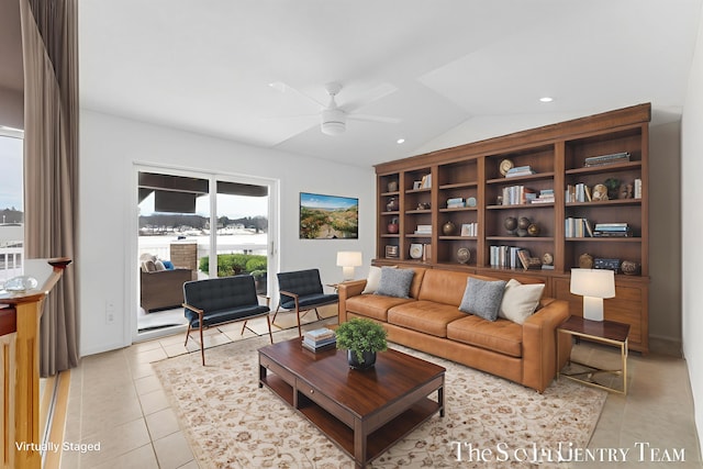 760 Bridgeview Bay Dr, Norton Shores, MI 49441 - living room with light tile patterned flooring, ceiling fan, vaulted ceiling, and recessed lighting