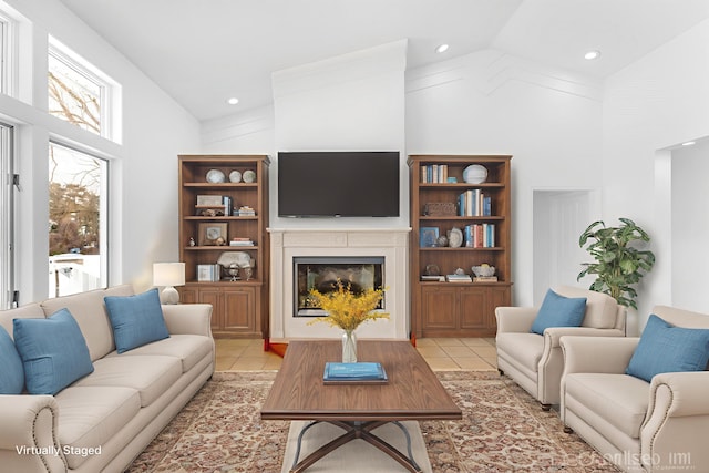 760 Bridgeview Bay Dr, Norton Shores, MI 49441 - living room featuring high vaulted ceiling, a fireplace, light tile patterned flooring, and recessed lighting