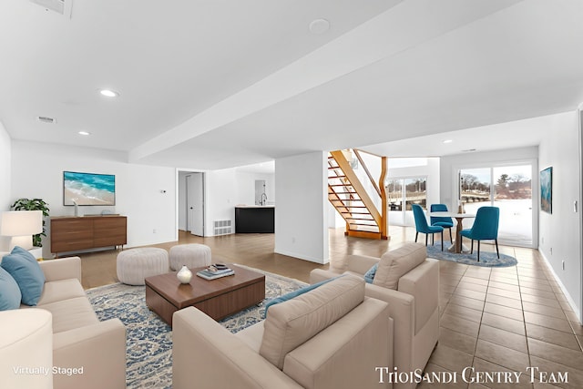 760 Bridgeview Bay Dr, Norton Shores, MI 49441 - living room featuring stairs, recessed lighting, and tile patterned floors