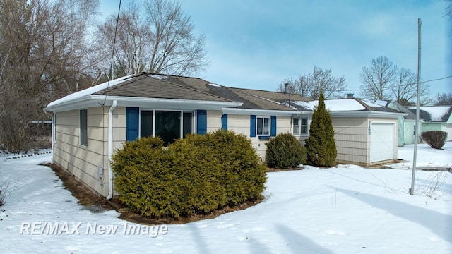 single story home with a garage