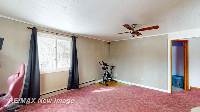 interior space featuring ornamental molding, carpet flooring, and baseboards