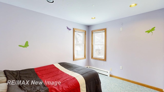 bedroom with carpet floors, baseboard heating, recessed lighting, and baseboards