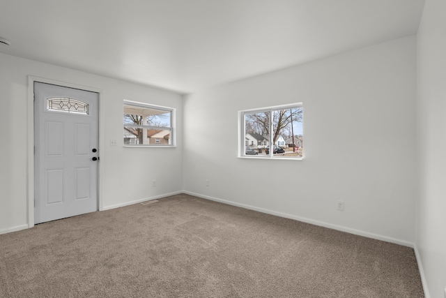 27734 Lasslett St, Roseville, MI 48066 - carpeted entryway with visible vents and baseboards