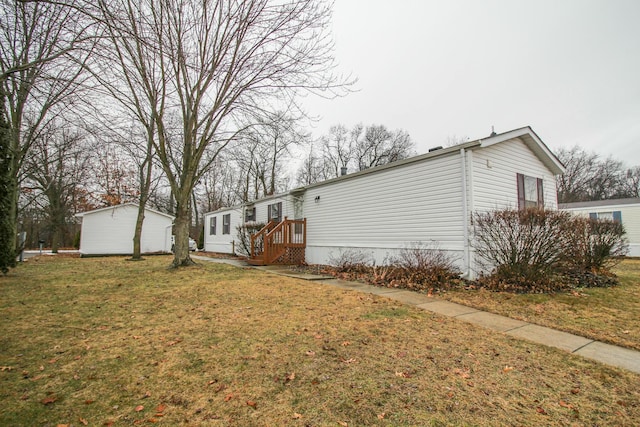 view of home's exterior featuring a yard