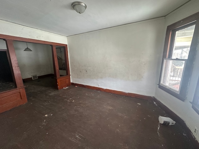 unfurnished bedroom featuring baseboards, visible vents, and a closet