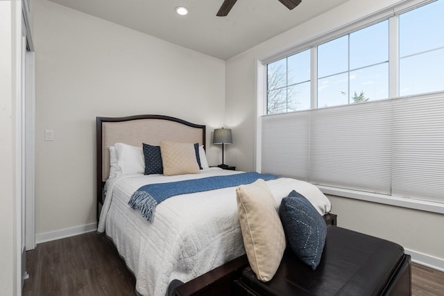 bedroom with dark wood-style floors, ceiling fan, recessed lighting, and baseboards