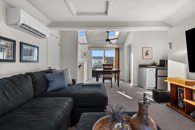 carpeted living area featuring attic access, an AC wall unit, vaulted ceiling, and baseboards