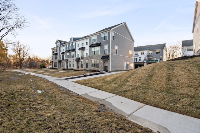 exterior space with a lawn