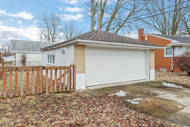 detached garage with fence