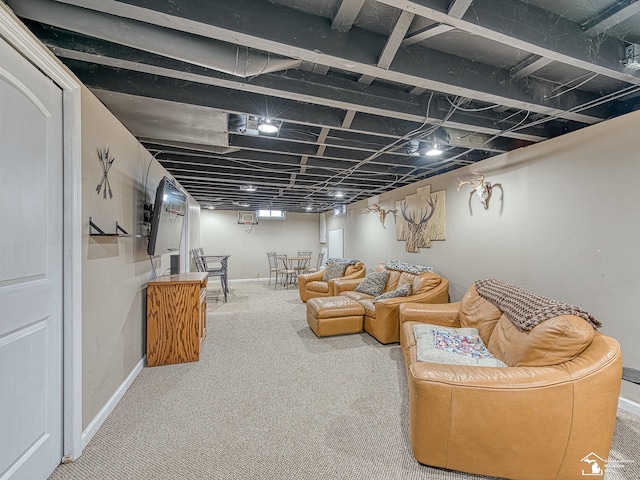 basement featuring carpet and baseboards